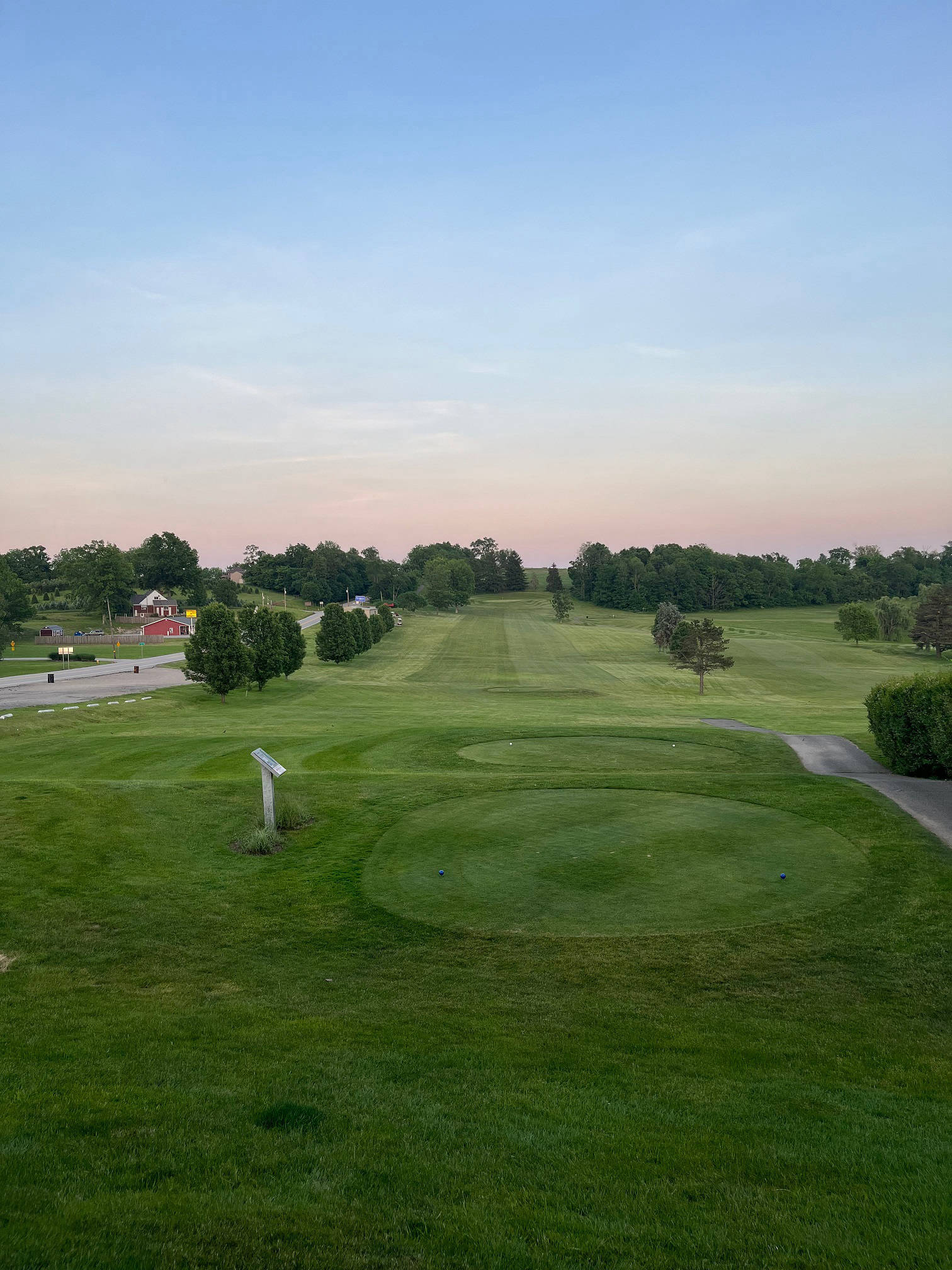 Putting green flag — placeholder photo, replace with images/practice-green.jpg